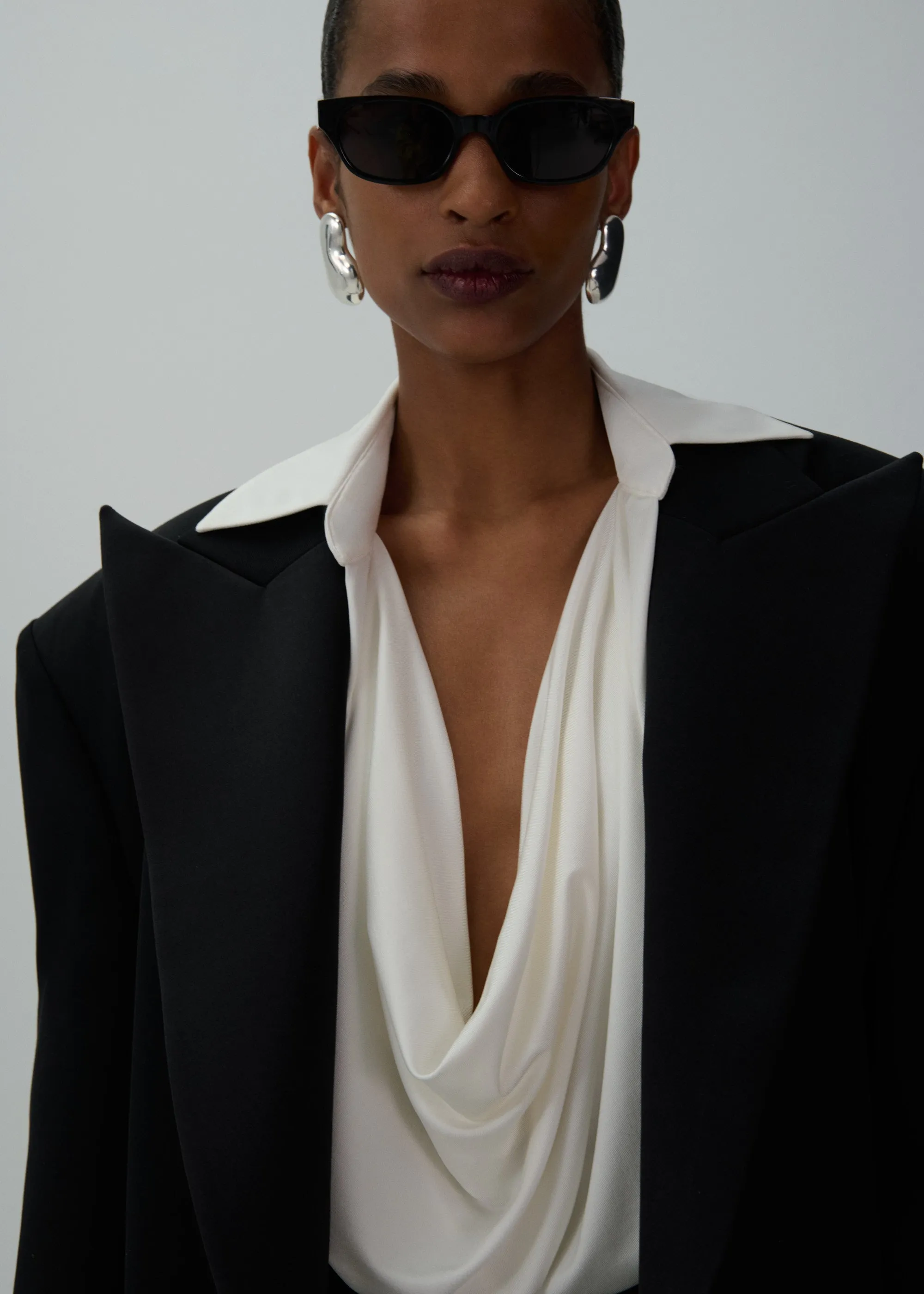 Draped jersey blouse in cream